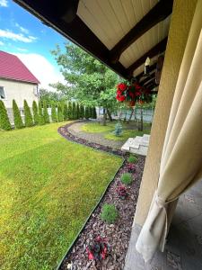 a view of a yard with a walkway at Садиба Villa Bella in Velyatyn +4 photos