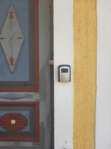 a door with a painting on the side of it at Strandhgarden B&B Cozy Room near Malmo in Oxie