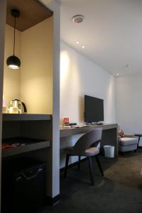 TV in/ali zabaviščno središče v nastanitvi Wonstar Hotel