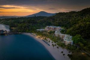 an aerial view of a beach with a resort at The St. Regis Langkawi in Kuah