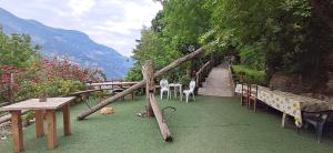 a garden with tables and chairs and a pathway at Rifugio Capo D,acqua in Positano +36 photos