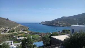 a view of a large body of water with mountains at Serenity Maisonnette in Otziás
