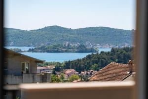 a view of a city and a lake from a building at Stars Apartments in Tivat +44 photos