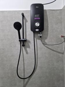 a speaker is hooked up to a table at OASIS Victoria Lounge! in Kandy