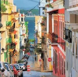 a view of a city street with cars parked at Star of the Olympus 2c Romantic Studio at Miramar Puerto Rico near beaches and Convention Center in San Juan