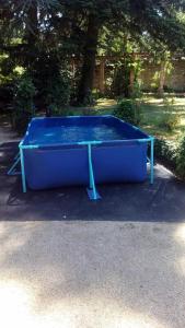 a large blue pool table in a park at Finca Villa Ángeles in San Rafael