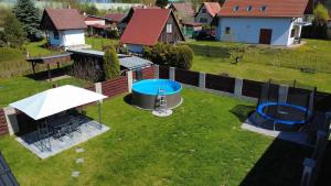 an aerial view of a backyard with two frisbees at Vila Jesenice in Lipová