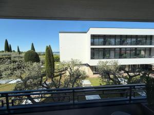 a view of a building from a balcony at Hotel Residence Holiday in Sirmione