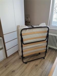 a towel rack in a room with a radiator at Apartman Meridian in Zaječar