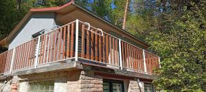 a wooden deck on top of a house at Chata Bítov in Bítov