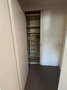 an empty room with a closet and a door at Ferienhaus Rotzinger in Hinterzarten