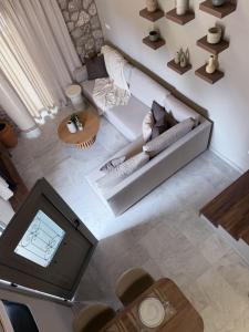 an overhead view of a living room with a couch at A Casa Di Zoi in Archangelos