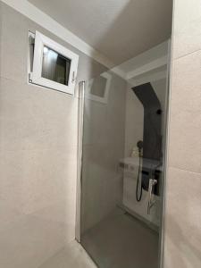 a shower with a glass door in a bathroom at Villa Marea in Nin +21 photos