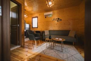 a living room with a couch and a table at Casa Arte in Ulcinj