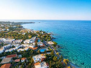 an aerial view of a resort next to the ocean at 4 Seasons villa-Sea view in Hersonissos