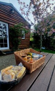 two baskets of bread and vegetables on a wooden table at Robins Rest in Donegal