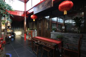 Restoran atau tempat makan lain di The Great Wall Courtyard Hostel