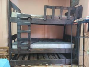 a set of bunk beds in a room at Alojamiento Artola para 4 personas in Sardinal