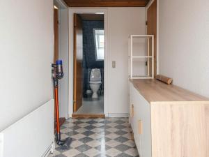 a room with a bathroom with a toilet in it at 2 person holiday home in Ringkøbing in Ringkøbing