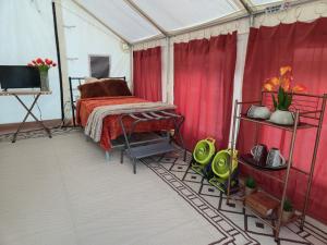 a bedroom with a bed in a tent at Starlit Jasmine in Christiansted