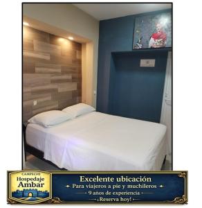 a poster of a bedroom with a bed in a room at AMBAR Rooms in Campeche +32 photos