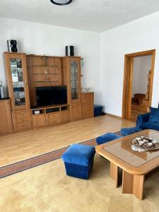 a living room with a couch and a table at Villa Lana in Bihać