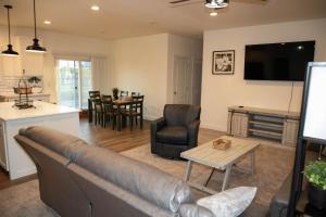 a living room with a couch and a table at Rural Farmhouse in Taylor
