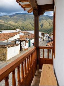 a view of a town from a balcony at Boutique La Gloria in Villa de Leyva +4 photos