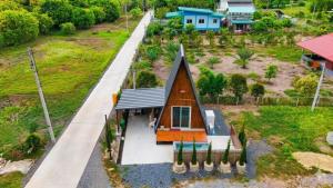 an overhead view of a small house with a porch at CK Family in Nakhon Nayok