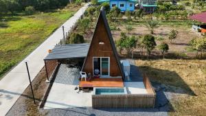 an overhead view of a small house with a pool at CK Family in Nakhon Nayok +10 photos