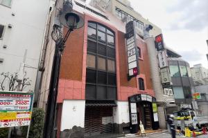 a building on the corner of a street at Daini Kuwamura Building 4th in Tokyo