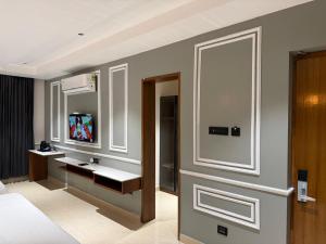 a bathroom with a sink and a mirror at Dusk and Dawn Beach Resort in Rāmeswaram +48 photos