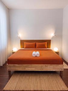 a bedroom with a bed with two towels on it at Centerpoint Koh Phangan New in Thong Sala +27 photos