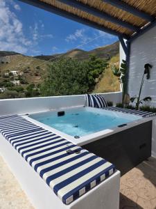 a jacuzzi tub sitting on top of a patio at THALASSA in Livadia