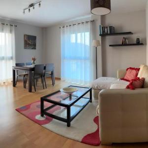 a living room with a couch and a table at Kalma Samaria in Pals