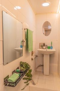 a bathroom with a sink and a mirror at 행궁주택 in Samgong +19 photos