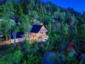 an aerial view of a house in the jungle at Ayo Hill Villa By Samhita Bali in Silebeng