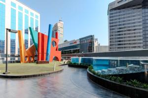 a view of a city with tall buildings at S31 Sukhumvit Hotel in Bangkok