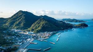an aerial view of a small island in the water at Nuu Takedamise, the Villa in Kami-yuge