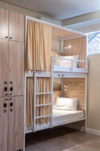 a bunk bed room with two bunk beds at Fresh hostel in Almaty