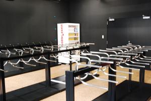 a row of wine racks in a wine tasting room at Always Niseko in Kutchan +16 photos