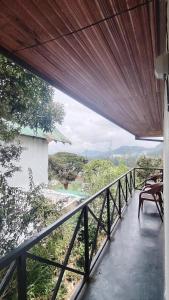 a view from the balcony of a house at B&B Nuwara eliya in Nuwara Eliya