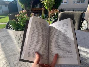 a person holding a book in their hand at CASA LUI MOȘU in Alba Iulia +142 photos