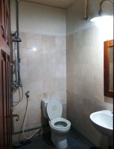 Vannituba majutusasutuses Omah Pitoe Yogya Homestay