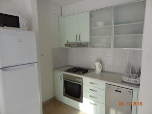 Kuchyň nebo kuchyňský kout v ubytování Holiday House Zorra
