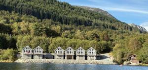 a row of houses on the shore of a lake at Sea house in beautiful surroundings in Haram