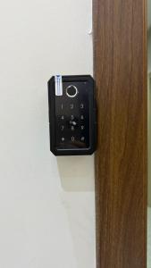 a electrical outlet on a wall next to a door at شقق سدايم in Jeddah