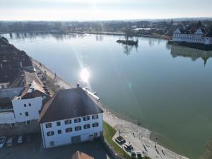 an aerial view of a river with a building at Baumgartner Camping am Inn in Schärding