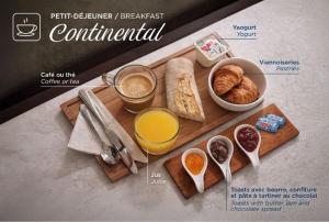a advertisement for a continental breakfast with bread and orange juice at Crisol Belle Epoque in Cannes