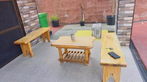 two benches and a table on a patio at Simla 16 in Lautoka +8 photos